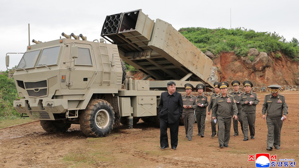 North Korean leader Kim Jong-un oversaw tests of major new weapons systems conducted by the DPRK Missile Administration and Academy of Defence Sciences on May 26 - Sputnik International