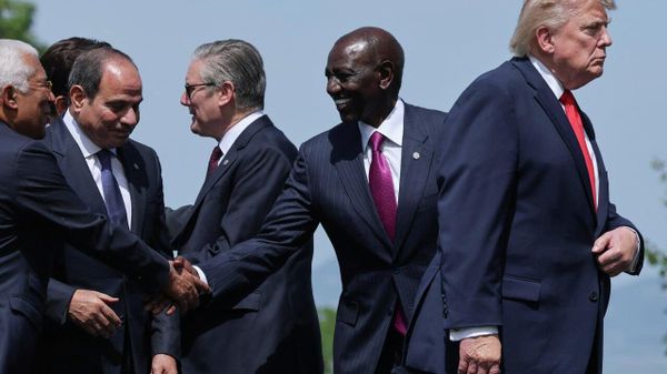 US President Donald Trump, European Council President Antonio Costa, Egyptian President Abdel Fattah al-Sisi, Kenya's President William Ruto and British Prime Minister Keir Starmer attend a family photo session during the G7 summit in France on June 16, 2026.  - Sputnik International