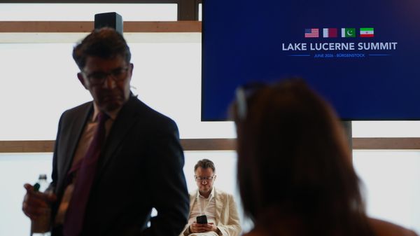Members of the media wait in the press center during the Iran US negotiations at the Burgenstock Resort in Obbuergen, near Lucerne, in Switzerland, Sunday, June 21, 2026. - Sputnik International