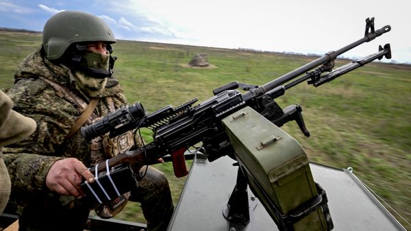 A Russian serviceman of a mobile fire unit of the Yug Group of Forces is seen at a position in the Konstantinovka sector of the front line amid Russia's military operation in Ukraine. - Sputnik International