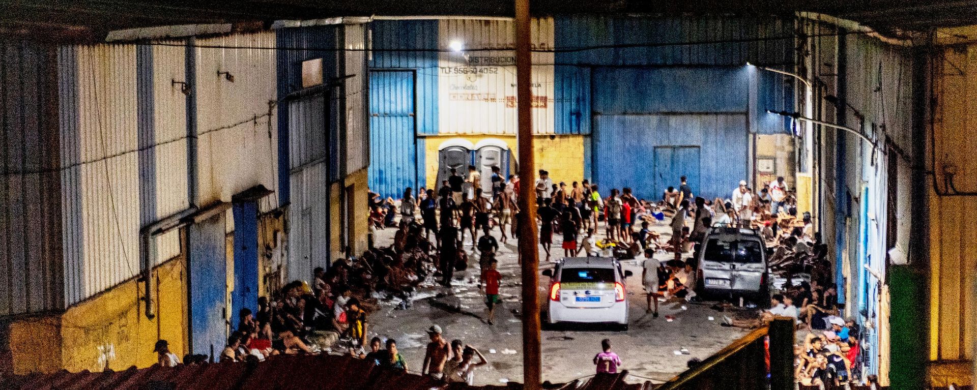 Migrants spend the night on the streets after crossing from Morocco into the Spanish enclave of Ceuta, Friday, July 31, 2026 - Sputnik International, 1920, 31.07.2026