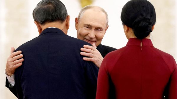Russian President Vladimir Putin and Vietnamese President To Lam - Sputnik International