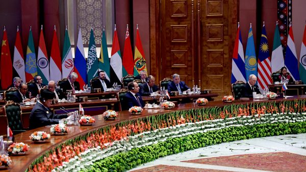 Russian President Vladimir Putin at the 18th BRICS summit in New Delhi. Seated at the table, from left to right: Indonesian President Prabowo Subianto and Egyptian President Abdel Fattah el-Sisi - Sputnik International