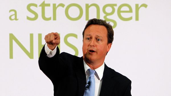 UK Prime Minister David Cameron gestures as he makes a speech about NHS reforms at University College Hospital in London, Tuesday, June, 7, 2011. UK Prime Minister David Cameron gestures as he makes a speech about NHS reforms at University College Hospital in London, Tuesday, June, 7, 2011. - Sputnik International
