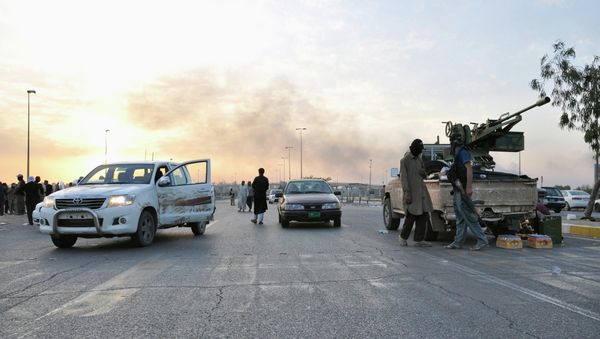 Fighters of the Islamic State of Iraq and the Levant (ISIL) stand guard at a checkpoint in the northern Iraq city of Mosul, in this June 11, 2014 file photo. Fighters of the Islamic State of Iraq and the Levant (ISIL) stand guard at a checkpoint in the northern Iraq city of Mosul, in this June 11, 2014 file photo. - Sputnik International