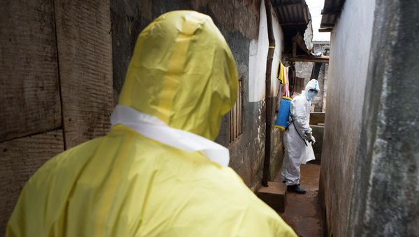 Health workers in protective equipment. Health workers in protective equipment. - Sputnik International