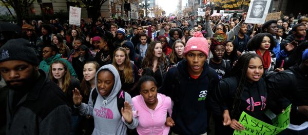 Protesters march in downtown Seattle, Tuesday, Nov. 25, 2014 Protesters march in downtown Seattle, Tuesday, Nov. 25, 2014 - Sputnik International