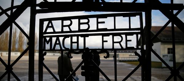 The main gate of the former Dachau concentration camp with the sign Arbeit macht frei (work sets you free) is seen in Dachau, near Munich, in this January 25, 2014 file picture. - Sputnik International