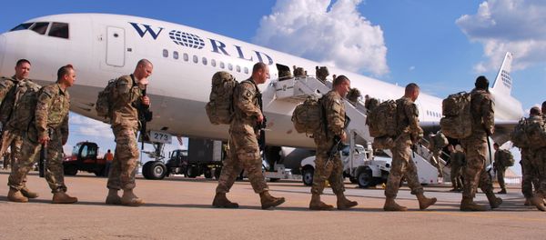 Soldiers from the 101st Airborne Division line up on Wednesday, May 8, 2013 to board a plane at Fort Campbell, Ky., to go to Afghanistan Soldiers from the 101st Airborne Division line up on Wednesday, May 8, 2013 to board a plane at Fort Campbell, Ky., to go to Afghanistan - Sputnik International