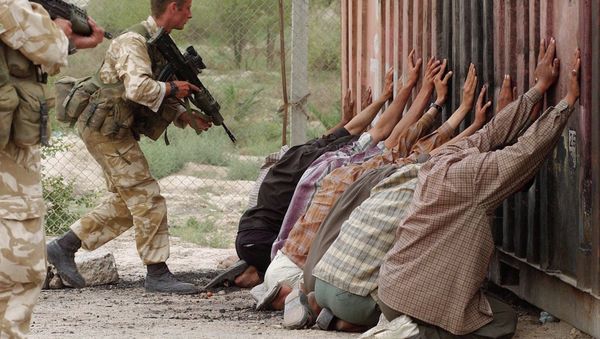 Suspected Iraqi soldiers are arrested by Royal Marines at a checkpoint in Basra Suspected Iraqi soldiers are arrested by Royal Marines at a checkpoint in Basra - Sputnik International