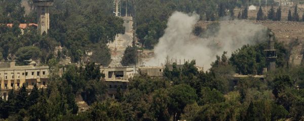 Smoke rises following a Syrian strike in Syria's old city of Quneitra near the border crossing between Syria and the Israeli-controlled Golan Heights Smoke rises following a Syrian strike in Syria's old city of Quneitra near the border crossing between Syria and the Israeli-controlled Golan Heights - Sputnik International
