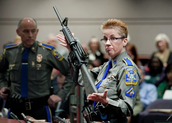 In this Jan. 28, 2013, file photo, firearms training unit Detective Barbara J. Mattson, of the Connecticut State Police, holds up a Bushmaster AR-15 rifle, the same make and model of gun used by Adam Lanza in the Sandy Hook School shooting, for a demonstration during a hearing of a legislative subcommittee reviewing gun laws, at the Legislative Office Building in Hartford, Connecticut. In this Jan. 28, 2013, file photo, firearms training unit Detective Barbara J. Mattson, of the Connecticut State Police, holds up a Bushmaster AR-15 rifle, the same make and model of gun used by Adam Lanza in the Sandy Hook School shooting, for a demonstration during a hearing of a legislative subcommittee reviewing gun laws, at the Legislative Office Building in Hartford, Connecticut. - Sputnik International