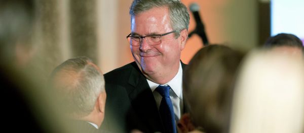 Former Florida Gov. Jeb Bush talks to supporters after speaking at the U.S. Cuba Democracy PAC's 11th Annual Luncheon in Coral Gables, Fla. - Sputnik International