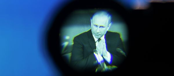 Russian President Vladimir Putin seen gesturing in a camera viewfinder during his annual news conference in Moscow, Russia, Thursday, Dec. 18, 2014. The Russian economy will rebound and the ruble will stabilize, Russian President Vladimir Putin said Thursday at his annual press conference, he also said Ukraine must remain one political entity, voicing hope that the crisis could be solved through peace talks. Russian President Vladimir Putin seen gesturing in a camera viewfinder during his annual news conference in Moscow, Russia, Thursday, Dec. 18, 2014. The Russian economy will rebound and the ruble will stabilize, Russian President Vladimir Putin said Thursday at his annual press conference, he also said Ukraine must remain one political entity, voicing hope that the crisis could be solved through peace talks. - Sputnik International