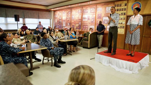 President Barack Obama, with first lady Michelle Obama, greets troops and their families on Christmas Day, Thursday, Dec. 25, 2014, at Marine Corps Base Hawaii in Kaneohe Bay, Hawaii during the Obama family vacation. President Barack Obama, with first lady Michelle Obama, greets troops and their families on Christmas Day, Thursday, Dec. 25, 2014, at Marine Corps Base Hawaii in Kaneohe Bay, Hawaii during the Obama family vacation. - Sputnik International