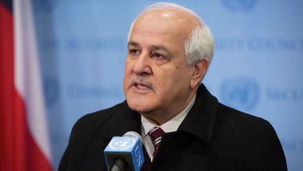 In this photo provided by the United Nations, Palestinian Ambassador to the U.N. Riyad Mansour addresses the media at U.N. headquarters after submitting documents to join the International Criminal Court on Friday, Jan. 2, 2015. The Palestinians moved quickly to join the court after suffering a defeat in the U.N. Security Council, which rejected a resolution Tuesday that would have set a three-year deadline for the establishment of a Palestinian state on lands occupied by Israel. - Sputnik International