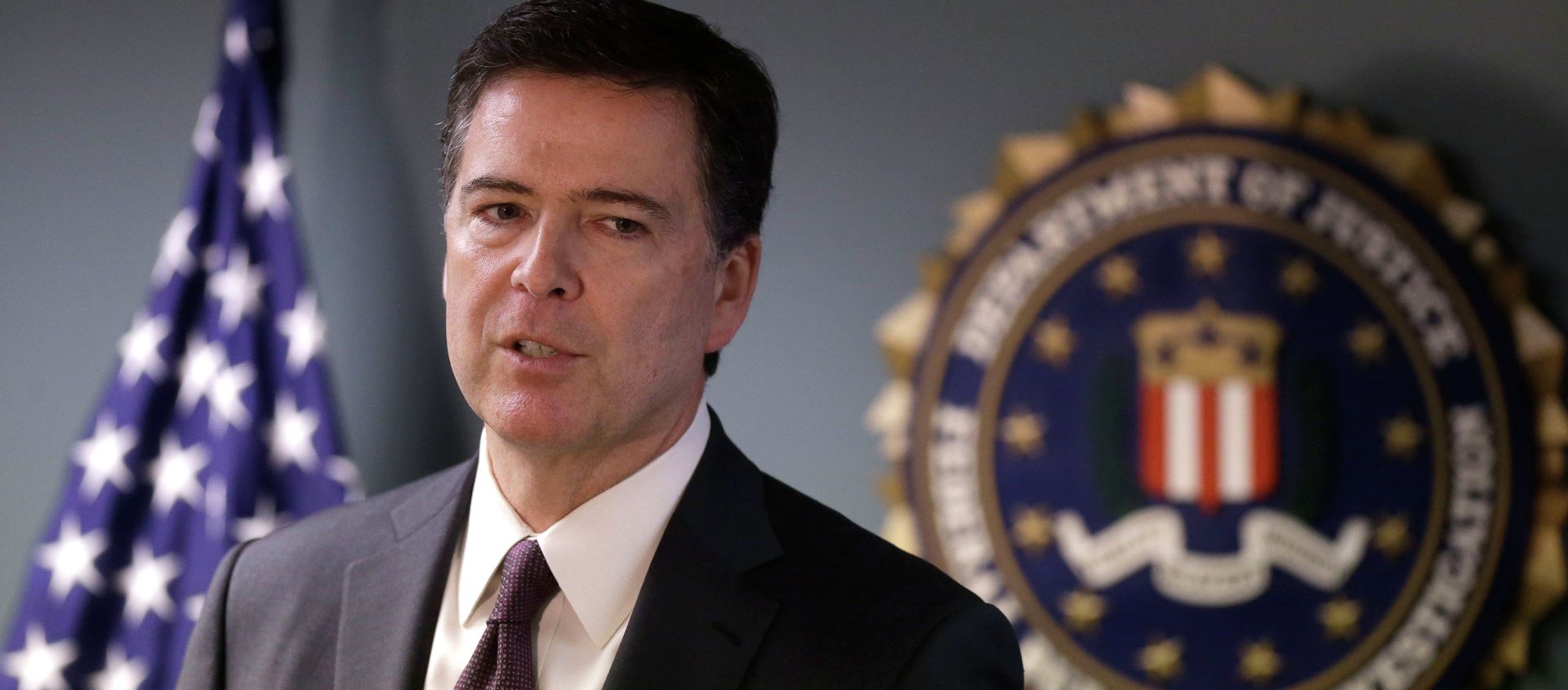 FBI Director James Comey takes questions from members of the media during a news conference, on 18 November 2014 in Boston.  - Sputnik International, 1920, 29.10.2020