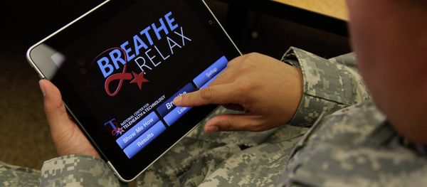 Sgt. Mark Miranda, a public affairs specialist stationed at Joint Base Lewis-McChord in Washington state, demonstrates the use of a program for tablet computers and smart phones that is designed to help calm symptoms of post-traumatic stress and traumatic brain injury, Friday, July 22, 2011. Miranda said he does not suffer from PTSD, but after trying the app, he said he may suggest its use to other soldiers who he has deployed with. Sgt. Mark Miranda, a public affairs specialist stationed at Joint Base Lewis-McChord in Washington state, demonstrates the use of a program for tablet computers and smart phones that is designed to help calm symptoms of post-traumatic stress and traumatic brain injury, Friday, July 22, 2011. Miranda said he does not suffer from PTSD, but after trying the app, he said he may suggest its use to other soldiers who he has deployed with. - Sputnik International