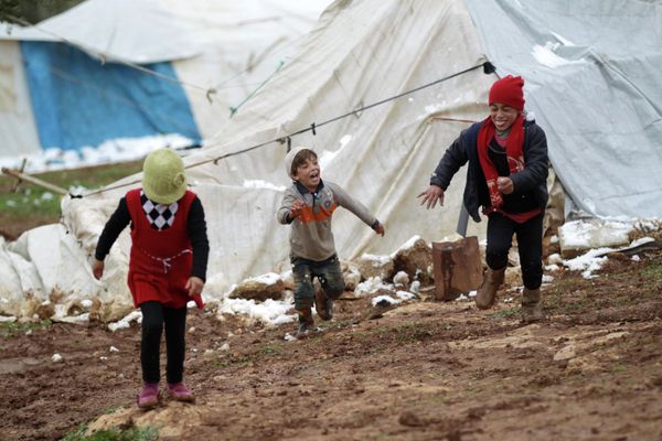 Children play in the ruins of a destroyed Syrian town Children play in the ruins of a destroyed Syrian town - Sputnik International