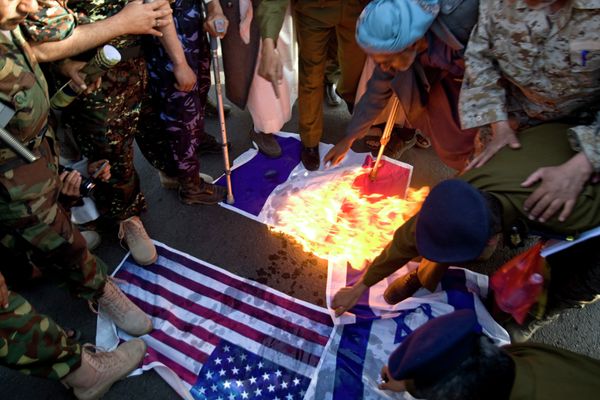 Yemeni protesters burn representations of French, American and Israeli flags during a demonstration to show their support for Houthi Shiite rebels in Sana'a. Prior to the official suspension of operations, the political situation in Yemen had already deteriorated and hampered intelligence gathering capabilities for US-led, Yemeni-manned raids against AQAP targets. Yemeni protesters burn representations of French, American and Israeli flags during a demonstration to show their support for Houthi Shiite rebels in Sana'a. Prior to the official suspension of operations, the political situation in Yemen had already deteriorated and hampered intelligence gathering capabilities for US-led, Yemeni-manned raids against AQAP targets. - Sputnik International