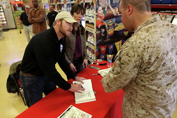 The real Chris Kyle signs copies of his book at Camp Pendleton in 2012 The real Chris Kyle signs copies of his book at Camp Pendleton in 2012 - Sputnik International