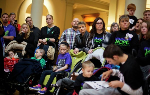This Jan. 13, 2015 file photo, shows parents of children who suffer from epilepsy. With virtually no hard proof that medical marijuana benefits sick children, and evidence that it may harm developing brains, the drug should only be used for severely ill kids who have no other treatment option, the nation's most influential pediatricians group says in a new policy. This Jan. 13, 2015 file photo, shows parents of children who suffer from epilepsy. With virtually no hard proof that medical marijuana benefits sick children, and evidence that it may harm developing brains, the drug should only be used for severely ill kids who have no other treatment option, the nation's most influential pediatricians group says in a new policy. - Sputnik International