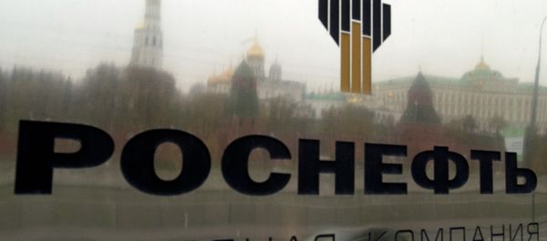 A sign at the entrance to the Rosneft oil and gas company building in the Sofia Embankment in Moscow - Sputnik International