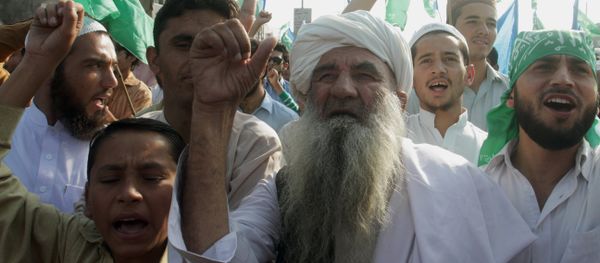 Supporters of Pakistan's religious party Jamaat-e-Islami rally to condemn the court verdict against Bangladeshi religious leader. Supporters of Pakistan's religious party Jamaat-e-Islami rally to condemn the court verdict against Bangladeshi religious leader. - Sputnik International