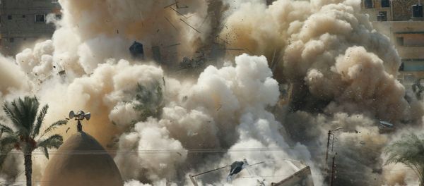 Smoke rises after a house is blown up during a military operation by Egyptian security forces in the Egyptian city of Rafah, near the border with southern Gaza Strip October 29, 2014. At least 33 Egyptian security personnel were killed on Friday in the Sinai Peninsula bordering Israel and Gaza, in an attack on a checkpoint that bore the marks of assaults claimed by Egypt's most active militant group Ansar Bayt al-Maqdis - Sputnik International
