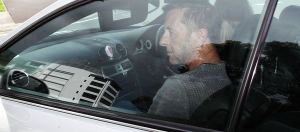 AC/DC drummer Phil Rudd leaves Tauranga District Court after being charged with attempting to procure murder at Tauranga District Court on November 6, 2014 in Tauranga, New Zealand - Sputnik International