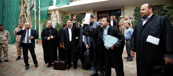 Libyan lawyers celebrate after the court invalidated the country's parliament, outside the Supreme Court in Tripoli, November 6, 2014 Libyan lawyers celebrate after the court invalidated the country's parliament, outside the Supreme Court in Tripoli, November 6, 2014 - Sputnik International