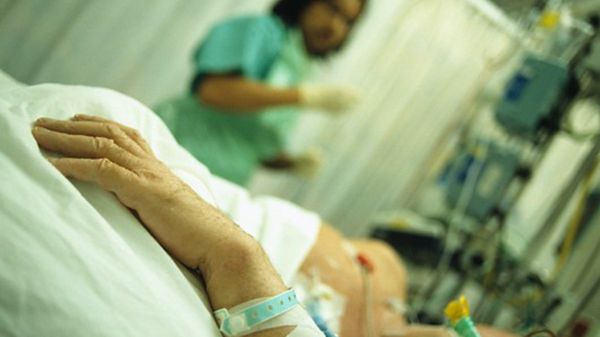 Intensive care. Hand of a patient who is being attended by a nurse in an intensive care unit (ICU) Intensive care. Hand of a patient who is being attended by a nurse in an intensive care unit (ICU) - Sputnik International
