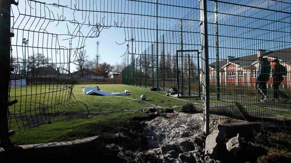A crater caused by shelling is seen near a school's soccer field in Donetsk, eastern Ukraine, November 6, 2014 A crater caused by shelling is seen near a school's soccer field in Donetsk, eastern Ukraine, November 6, 2014 - Sputnik International