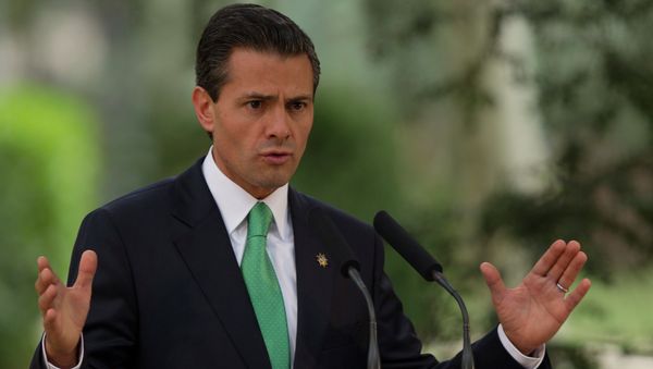 Mexico's President Enrique Pena Nieto condemned protests over students' murder early Monday after the National Palace was set on fire. - Sputnik International
