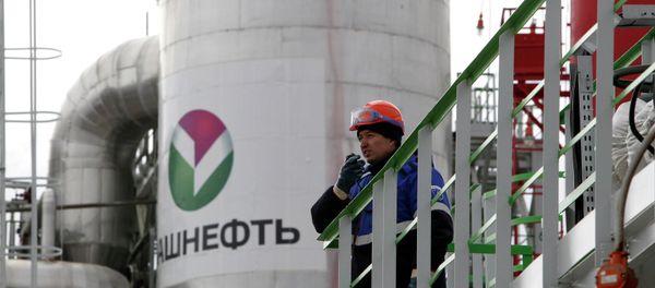 An employee talks on a portable radio set at a refinery owned by Bashneft company in the city of Ufa An employee talks on a portable radio set at a refinery owned by Bashneft company in the city of Ufa - Sputnik International