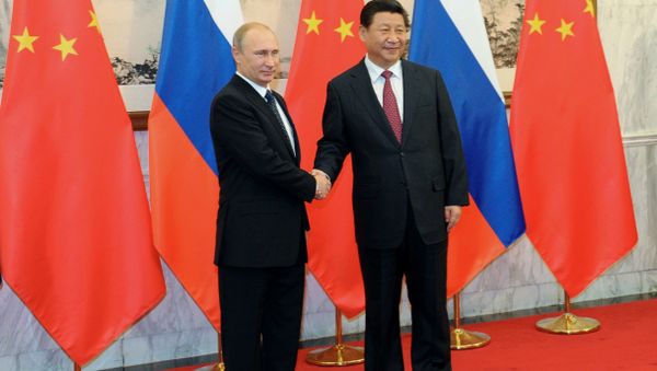 Russian President Vladimir Putin at the expanded meeting with Chinese President Xi Jinping, attended by the Russian and Chinese delegations, November 9, 2014. Russian President Vladimir Putin at the expanded meeting with Chinese President Xi Jinping, attended by the Russian and Chinese delegations, November 9, 2014. - Sputnik International