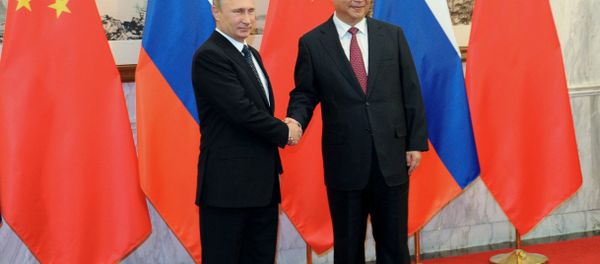 Russian President Vladimir Putin at the expanded meeting with Chinese President Xi Jinping, attended by the Russian and Chinese delegations, November 9, 2014. Russian President Vladimir Putin at the expanded meeting with Chinese President Xi Jinping, attended by the Russian and Chinese delegations, November 9, 2014. - Sputnik International