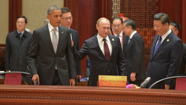 Russian President Vladimir Putin and US President Barack Obama spoke several times during the Asia Pacific Economic Cooperation summit in China, touching on bilateral relations and the situation in Syria, Ukraine, and Iran. - Sputnik International