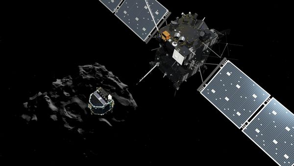 Lander Philae separating from the Rosetta spacecraft and descending to the surface of a comet, 12 November 2014  - Sputnik International