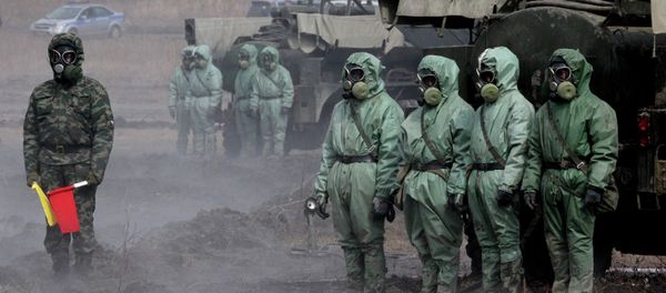 Servicemen of a radioactive and chemical protection unit during an inter-agency training exercise - Sputnik International