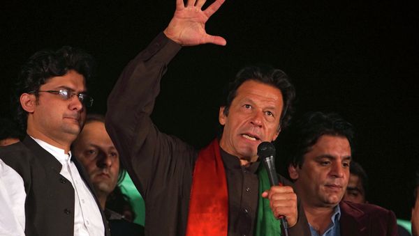 Pakistani politician Imran Khan addresses an anti-government rally near a parliament building in Islamabad, Pakistan, Tuesday, Oct. 21, 2014 - Sputnik International