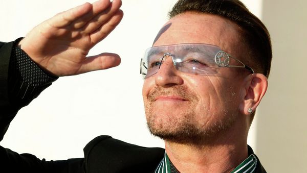 Bono, lead singer of the band U2, reacts after being awarded Commandeur des Arts et lettres (Commander in the Order of Arts and Letters) during a ceremony in Paris, in this file photo taken July 16, 2013 Bono, lead singer of the band U2, reacts after being awarded Commandeur des Arts et lettres (Commander in the Order of Arts and Letters) during a ceremony in Paris, in this file photo taken July 16, 2013 - Sputnik International