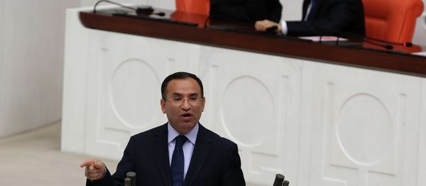Justice Minister Bekir Bozdag speaks during a special session of the parliament in Ankara, Turkey, Wednesday, March 19, 2014 Justice Minister Bekir Bozdag speaks during a special session of the parliament in Ankara, Turkey, Wednesday, March 19, 2014 - Sputnik International