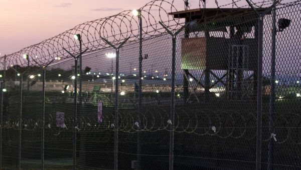 Guard tower at dawn at Camp Delta the military prison at Naval Base Guantanamo Bay Cuba Guard tower at dawn at Camp Delta the military prison at Naval Base Guantanamo Bay Cuba - Sputnik International