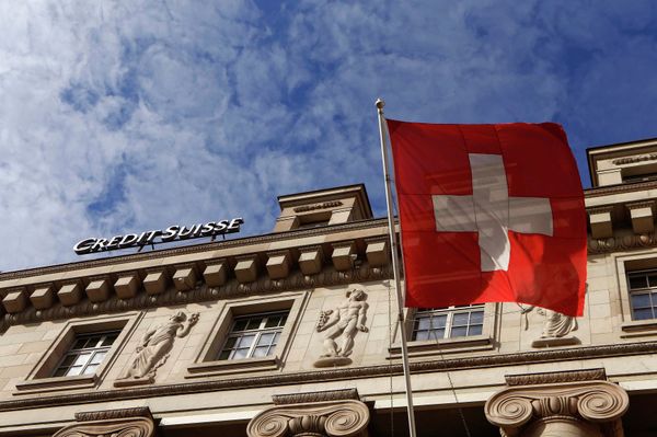 A national flag of Switzerland flies in front of a branch office of Swiss bank Credit Suisse in Luzern October 30, 2014 A national flag of Switzerland flies in front of a branch office of Swiss bank Credit Suisse in Luzern October 30, 2014 - Sputnik International