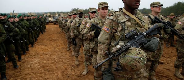 Members of the U.S. Army attend a military exercise 'Iron Sword 2014', at the Gaiziunu Training Range in Pabrade some 60km.(38 miles) north of the capital Vilnius, Lithuania - Sputnik International