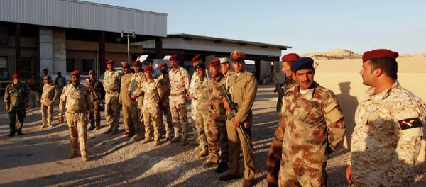 Iraqi security forces keep watch during a tribal conference, regarding the Islamic State, at the Ain al-Assad military base in the Anbar province, November 11, 2014 Iraqi security forces keep watch during a tribal conference, regarding the Islamic State, at the Ain al-Assad military base in the Anbar province, November 11, 2014 - Sputnik International