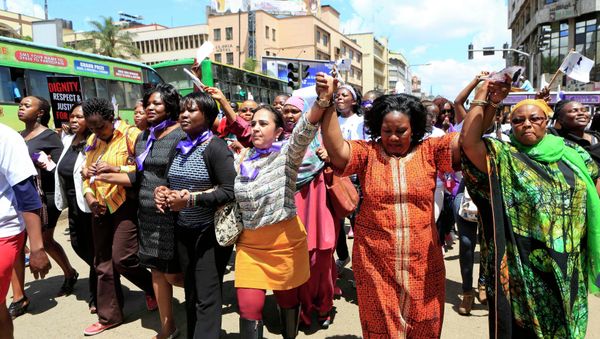 Protesters marched on the streets of Nairobi in support of a woman, who was attacked and stripped by a group of men last week. - Sputnik International