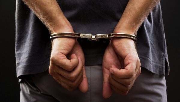 Detainee in handcuffs Detainee in handcuffs - Sputnik International