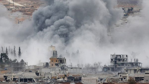 Smoke rises from the Syrian city of Kobani Smoke rises from the Syrian city of Kobani - Sputnik International